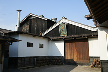 The entrance to the mirin brewery, displaying the Kokonoe Mirin signboard above